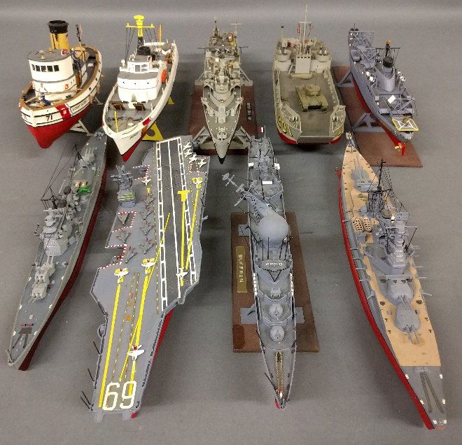 Grouping of nine ship models to include the USS Pine Is: Grouping of nine ship models to include the USS Pine Island and USS Niagara Falls. As found.Longest: 16 ¼ inches long.