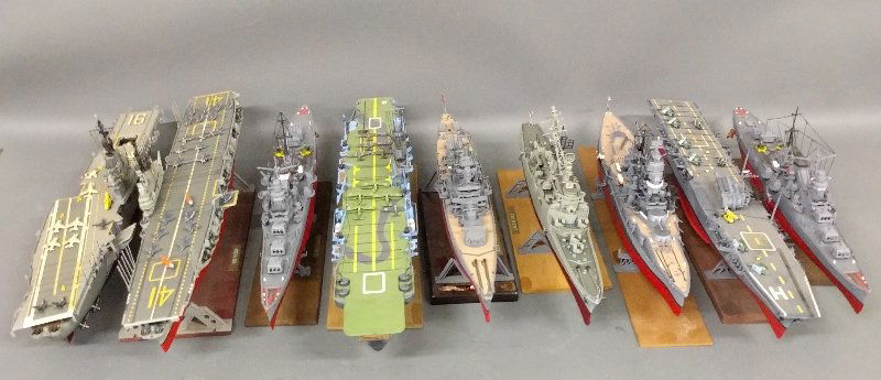 Grouping of nine ship models to include the USS Midway: Grouping of nine ship models to include the USS Midway and HMS Illustrious.Longest: 21 inches long.