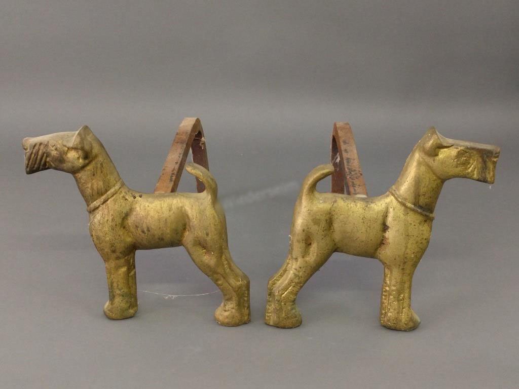 Bronze andirons: Pair of bronze standing Airedale andirons, 20th century. 9.5"h x 10"w x 13.5"l