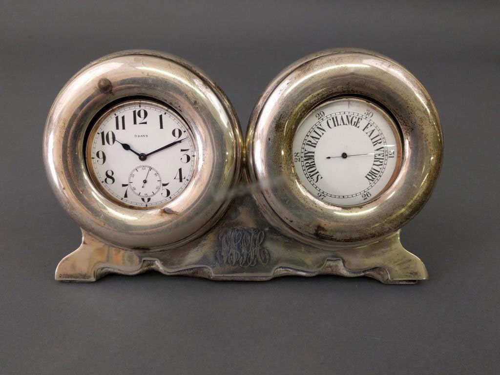 Sterling silver case: Sterling silver cased watch and barometer. 5"h x 8"w.