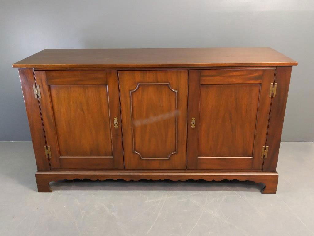 Sideboard: Kittinger, Williamsburg mahogany 3-door sideboard. 36.25"h x 66"w.