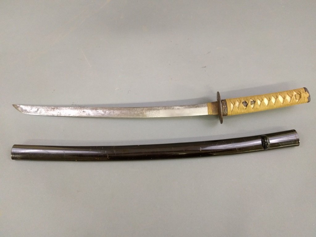 Japanese katana sword with wrapped shagreen handle: Japanese katana sword with wrapped shagreen handle and iron tsuba. 32"l.