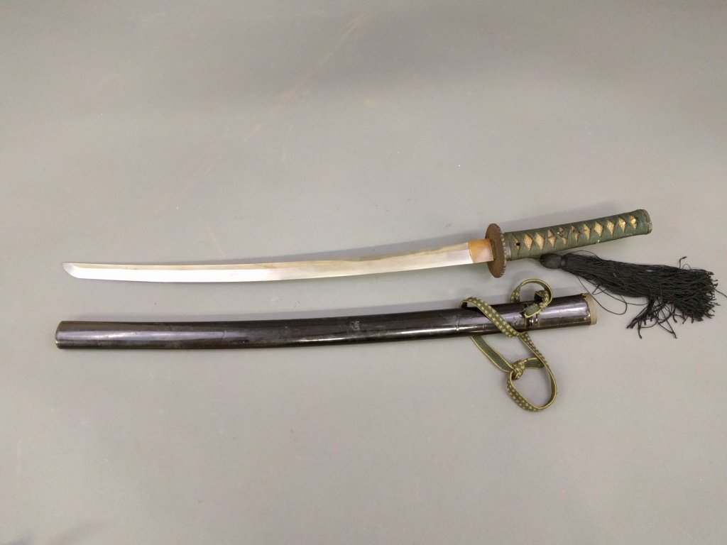 Japanese katana sword with wrapped shagreen handle: Japanese katana sword with wrapped shagreen handle and iron tsuba. 33.5"l.