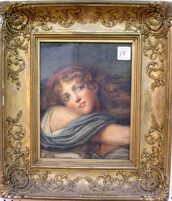 Gilt framed print of a young woman. 13.75"x10.5"