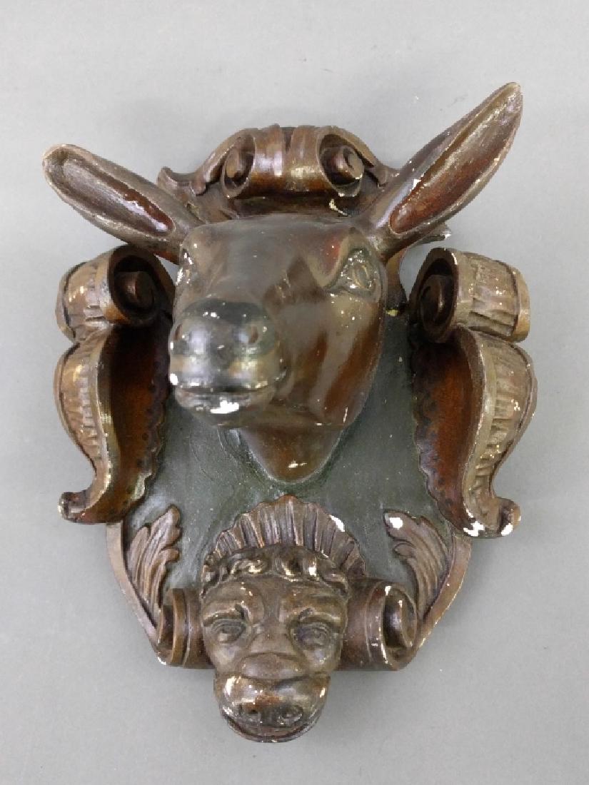 Plaster painted deer head: German plaster painted deer head, 20th century. 14"h. x 10"w.