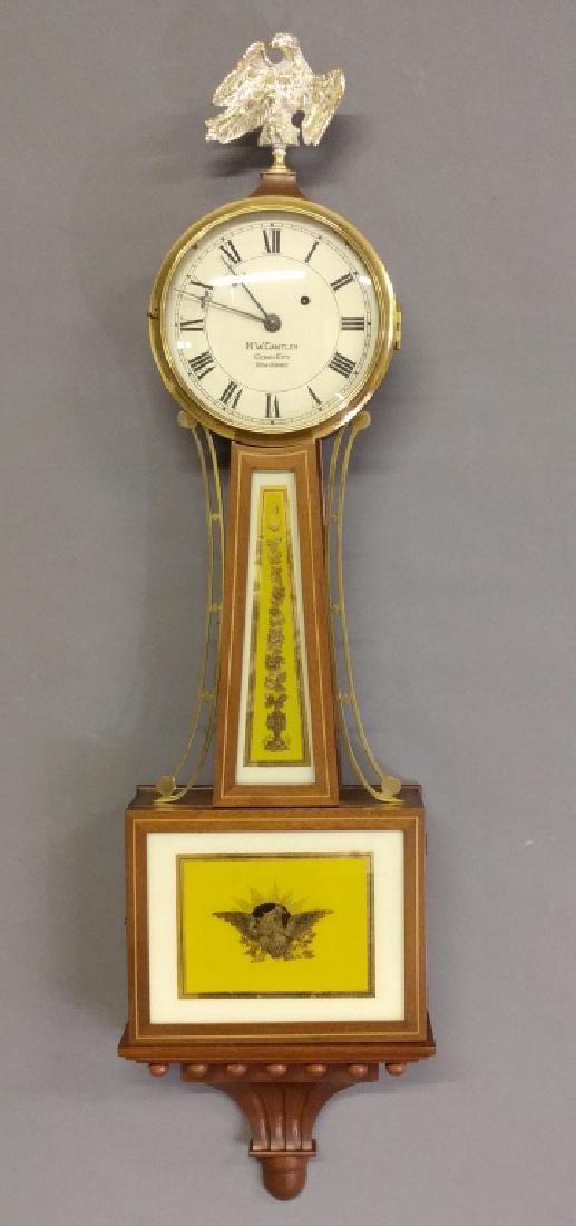 Presentation banjo clock: Mahogany presentation banjo clock with spring driven movement by "H.W. Cantley Ocean City, New Jersey", 20th century. 42"h.