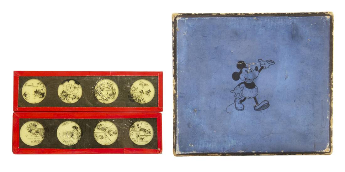 Complete Boxed Set of Mickey Mouse Toy Slides.: (Ensign Limited, c.1930s) A complete boxed collection containing (11) sets of Mickey Mouse toy lantern slides in individual boxes. These slides were created to be used in Mickey Mouse Magic Lantern to