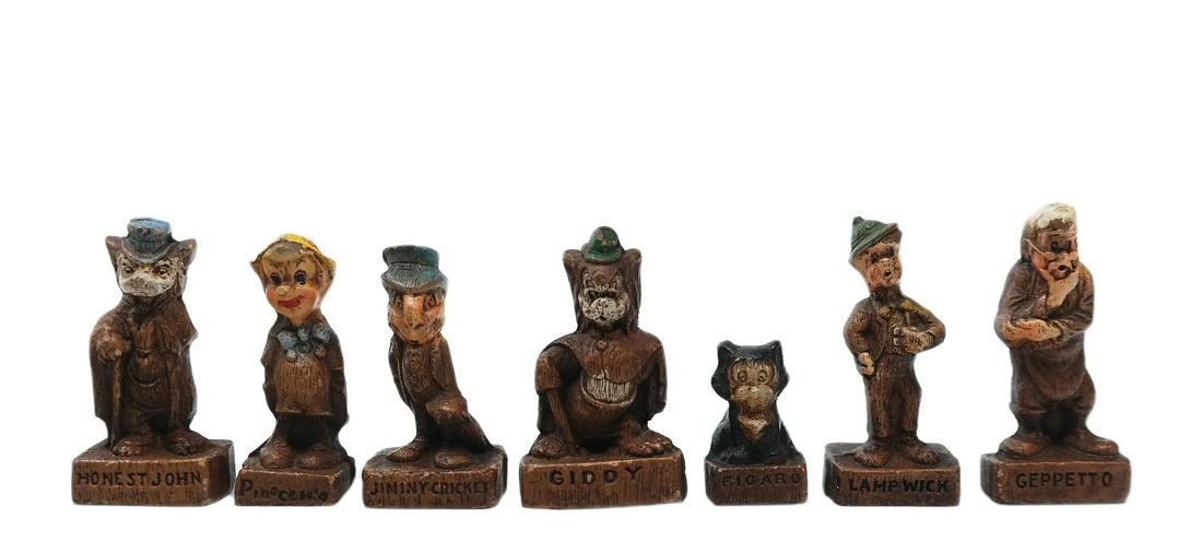 Set of (7) Pinocchio Character Figurines.: (Multi-Products, 1940) A collection of (7) hand-painted resin figures featuring characters from Pinocchio. The set includes Figaro, Jiminy Cricket, Pinocchio, Giddy, Honest John (Foulfellow), Lampwick