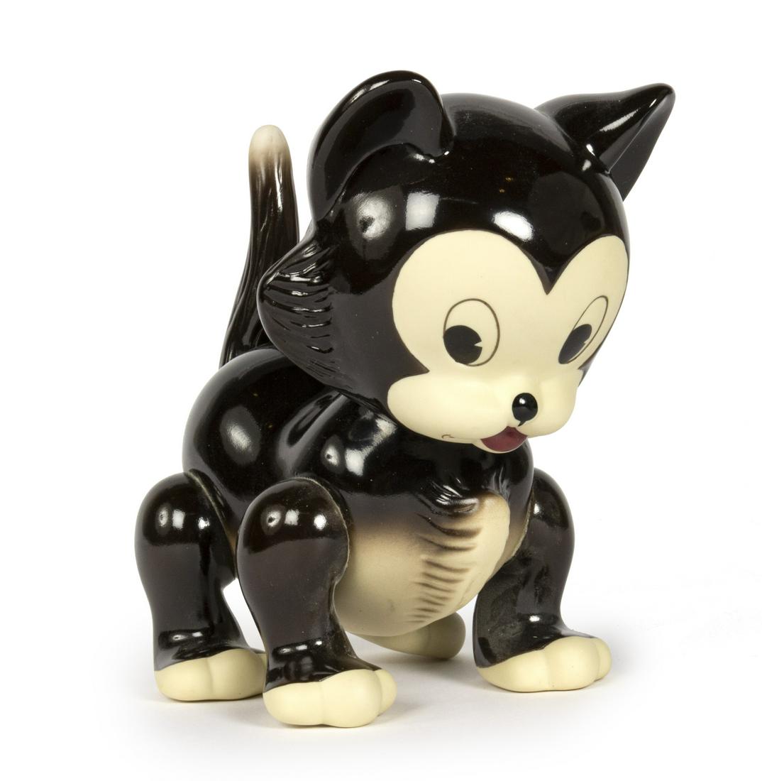 Knickerbocker Figaro the Cat Composition Doll.: (Knickerbocker, c.2000) A gorgeous reproduction of the popular 1940s composition doll of Figaro from the Disney animated film Pinocchio. The doll is made of porcelain, with jointed head, legs, and tai