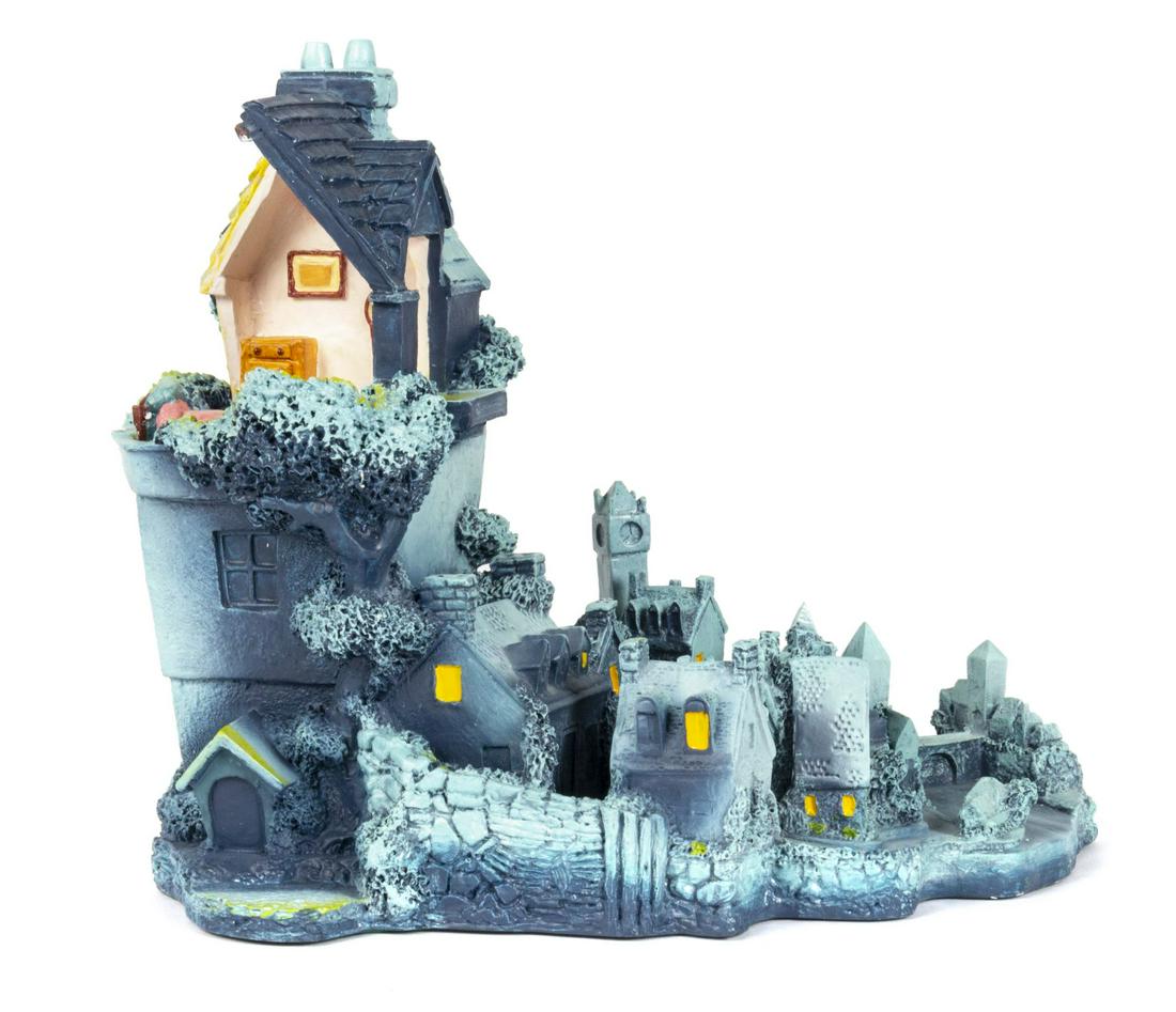 Goebel "Peter Pan's London" Figurine.: (Goebel, 1992) A handcrafted sculpture titled "Peter Pan's London" based on Walt Disney's Peter Pan. This sculpture is wonderfully detailed with a view into the Darlings' home, where Peter Pan's shado