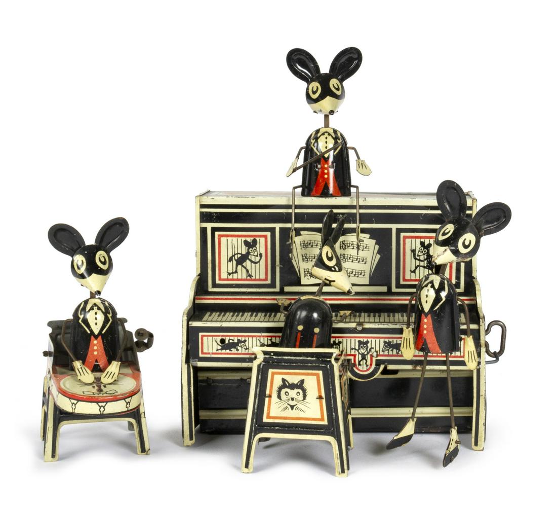 Marx MerryMakers Mickey Mouse Inspired Tin Toy.: (Marx, 1931) A very early tin wind-up toy by Marx Toys called the Marx MerryMakers. While not an officially licensed Walt Disney product, Marx drew inspiration from Walt Disney's newly-created cartoon