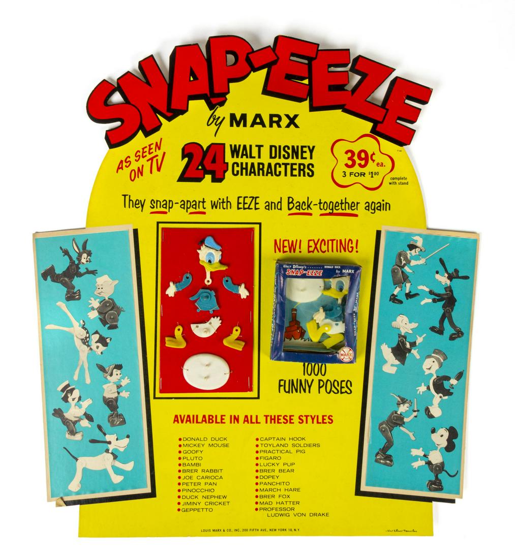 Snap-Eeze Display in Original Box.: (Marx, c.1960s) An incredibly rare store display for Marx's Snap-Eeze toys. The display features one Donald Duck Snap-Eeze toy disassembled to demonstrate how the figure functions, and a second still