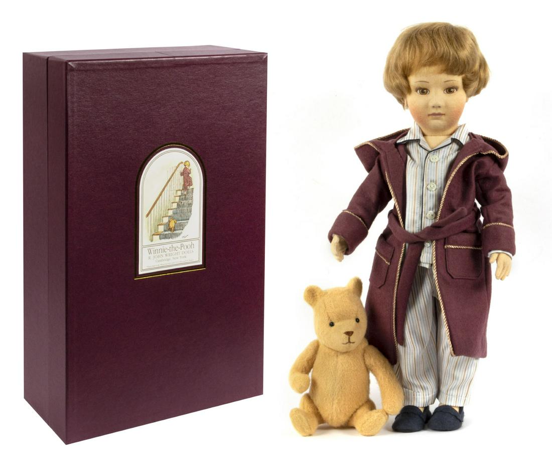 Christopher Robin & Pooh R. John Wright Dolls.: (R. John Wright, 1999) A beautiful R. John Wright "Christopher Robin and Pooh Bedtime" set featuring Winnie the Pooh and Christopher Robin. The limited edition dolls are number 323 in an edition of on
