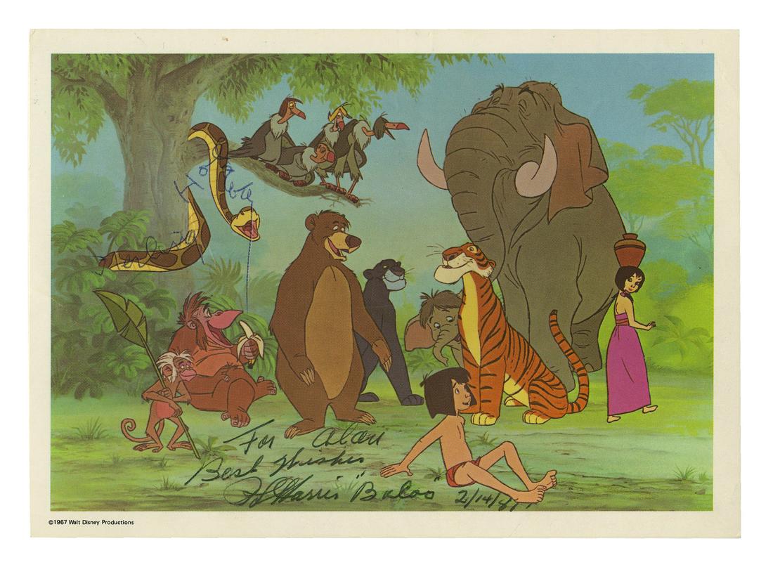 The Jungle Book Postcard Signed by Harris & Holloway.: (Walt Disney Studios, 1981) A postcard featuring the characters from Walt Disney's The Jungle Book that is signed by both Phil Harris, the voice of Baloo, and Sterling Holloway, the voice of Kaa. Harr