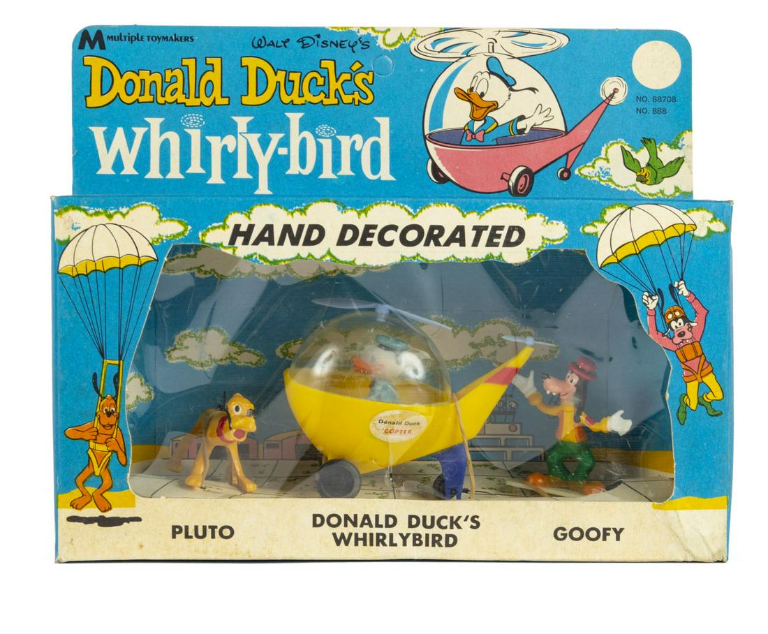 Donald Duck's Whirly-Bird Figure Set in Box.: (Multiple Toymakers, 1968) A set of hand-painted Walt Disney character toys depicting Pluto, Goofy, and Donald Duck inside a helicopter. This charming figure set comes in its original box with is beau