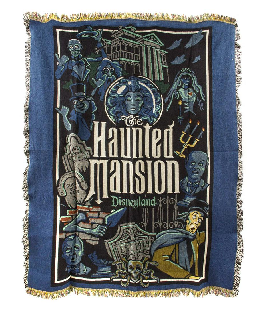 Haunted Mansion Large Throw Blanket.: (Disneyland, c.2000) A rare large blanket featuring imagery from Disneyland's Haunted Mansion. The blanket depicts Madame Leota, the Hitchhiking Ghosts, Ghost Bride, singing busts, and other notable c