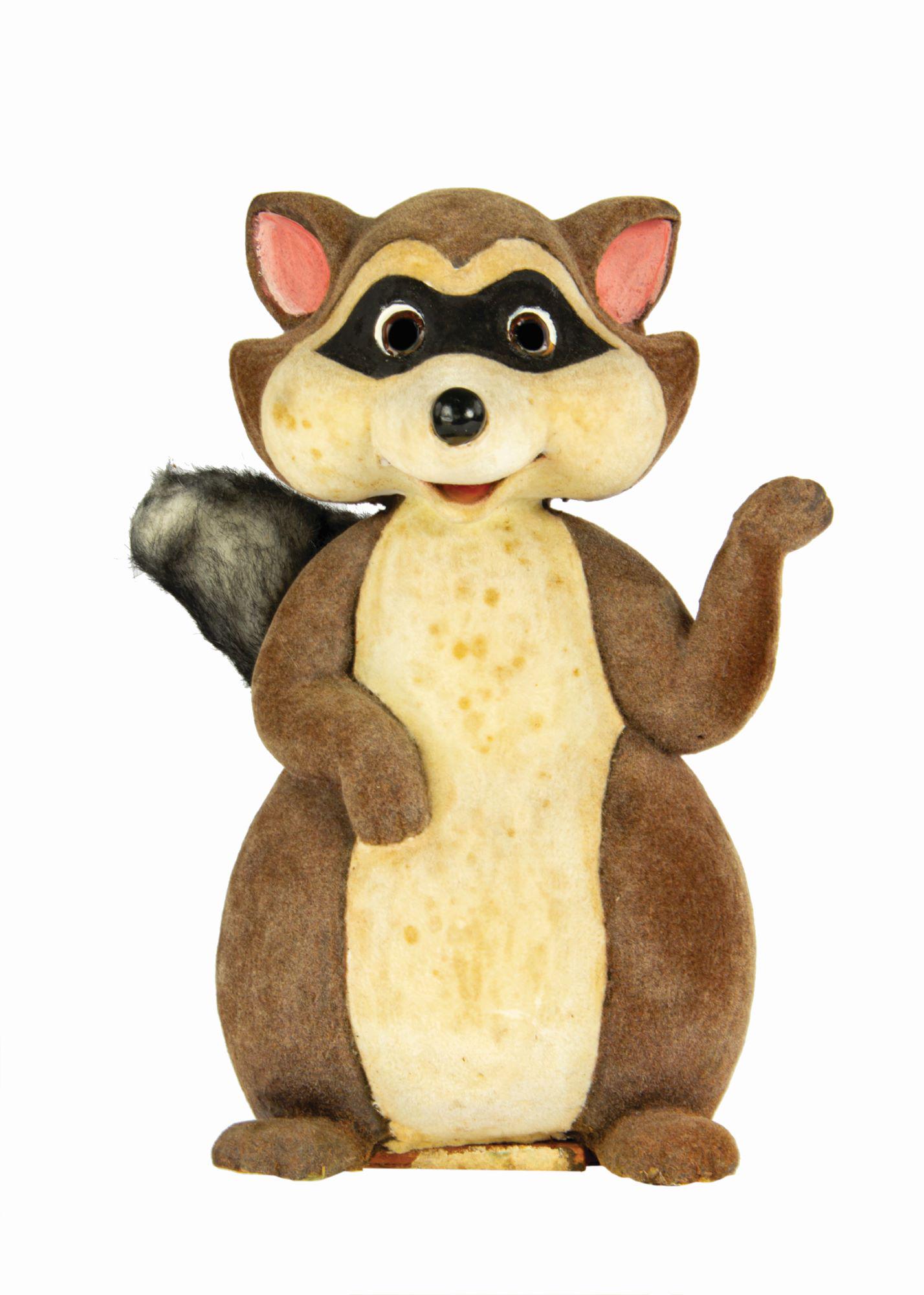 Main Street Window Display Raccoon Figure.: (Disneyland, 1970s) An original Raccoon prop figure used within a Bambi themed window display at the Main Street Emporium. Composed of dense foam coated in felt, the figure has a wooden block and scre