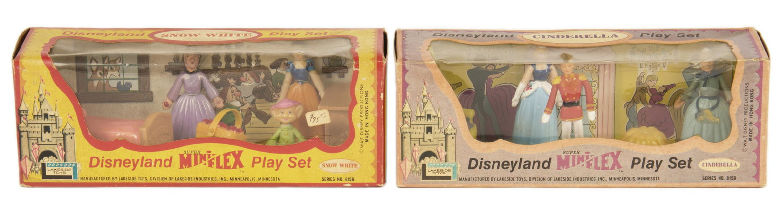 Pair of Disneyland Miniflex Playsets.: (Disneyland, c.1960s) A pair of Disneyland Miniflex Play Sets based on Cinderella and Snow White. These play sets have deep window boxes containing three figures and plastic accessories. The character