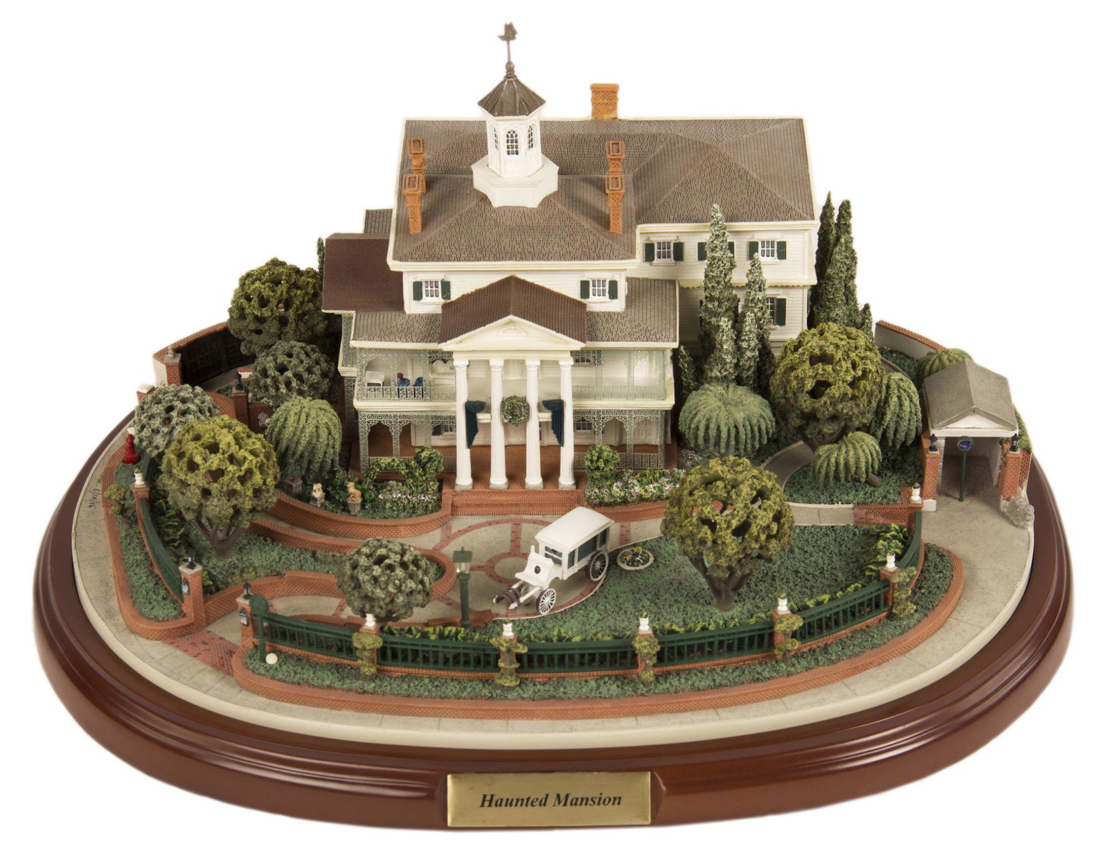 Olszewski Haunted Mansion Model.: (Disneyland, 2005) An incredible 1/220th scale model of Disneyland's Haunted Mansion attraction building created by Robert Olszewski. This very rare replica includes three scenes from the attraction w