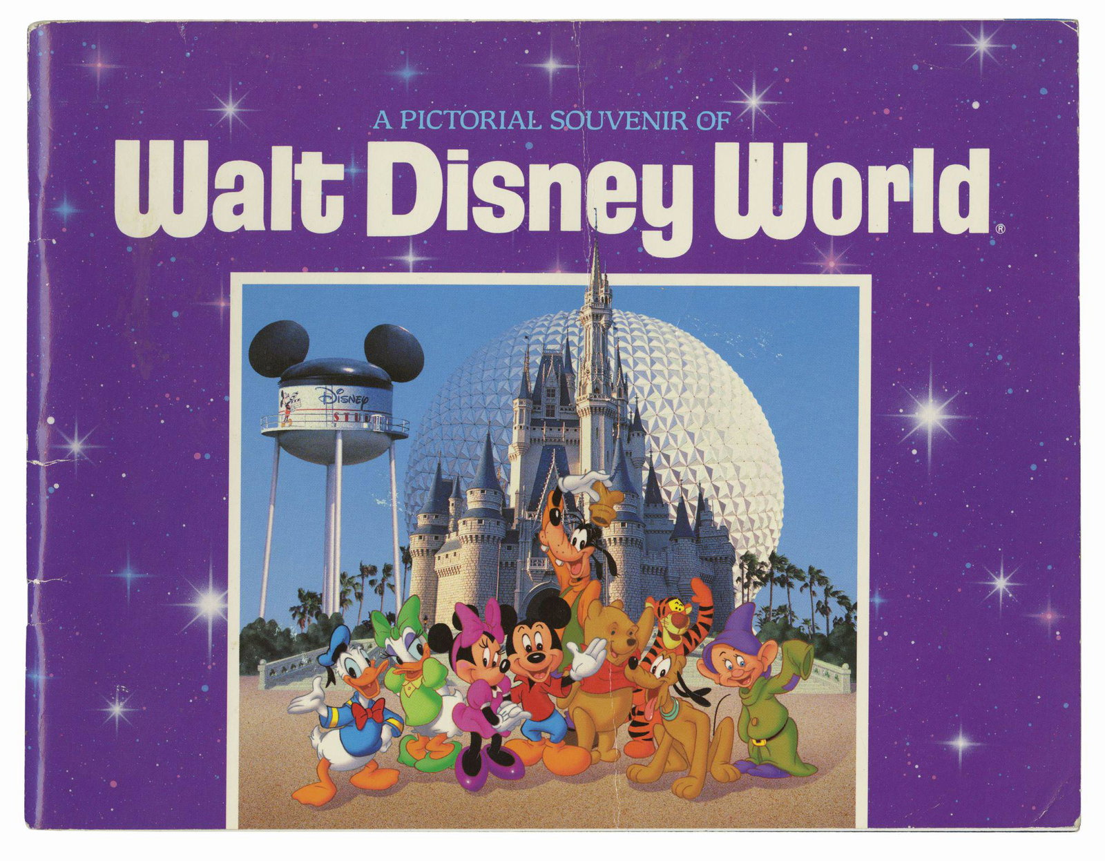 "A Pictorial Souvenir of Walt Disney World" Guidebook.: (Walt Disney World, c.1989) A pictorial souvenir guidebook featuring a color photo tour through the resort. This edition includes information about Typhoon Lagoon and the Disney-MGM Studios, which ope