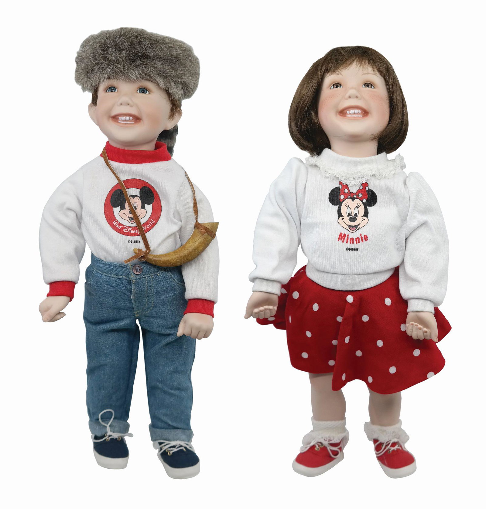 Pair of Ashton-Drake Porcelain Walt Disney World Dolls.: (Walt Disney World, c.2001) A pair of Walt Disney World Ashton-Drake porcelain dolls. The dolls are titled "Walt Disney World Boy" and "Walt Disney World Girl," and feature the children in great Disne