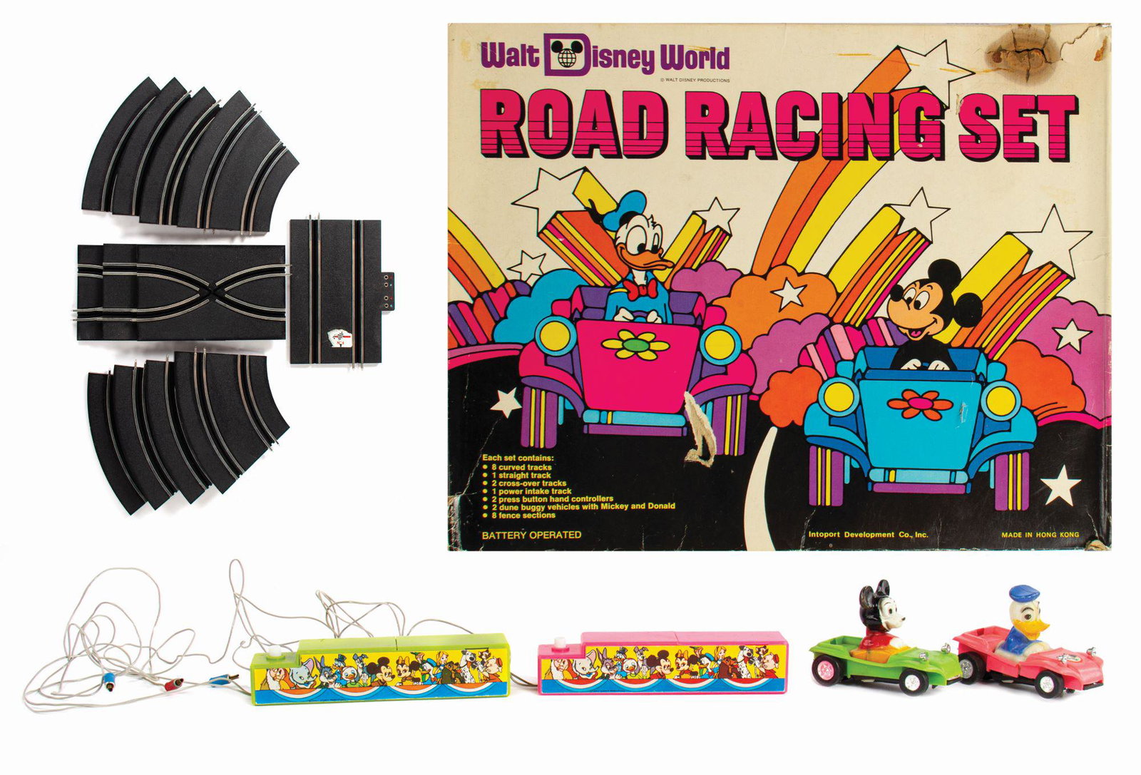 Walt Disney World Road Racing Set in Box.: (Walt Disney World, 1970s) A very rare Road Racing Set that is complete in its original box. This battery-operated play set includes Donald and Mickey figures which race around the track. The original
