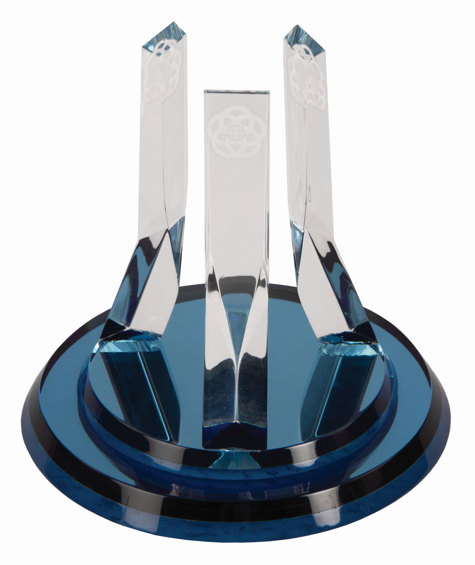 Epcot Center Prism Sculpture.: (Epcot, 1982) A small replica of the prism sculpture seen in front of Epcot's Spaceship Earth. Created in plastic over a blue mirrored base, the replica measures approximately 7" tall and is in very g