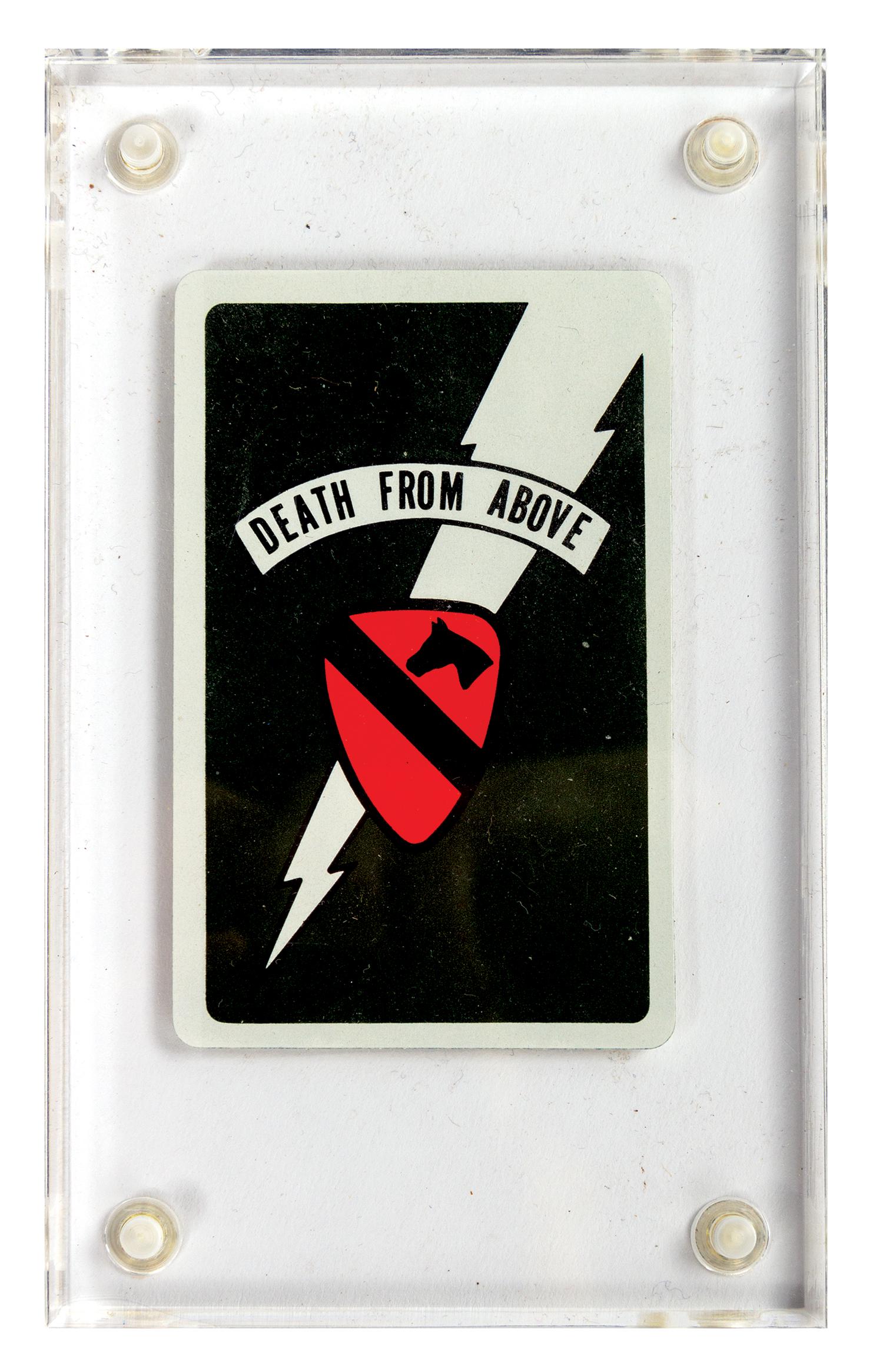 Apocalypse Now Death Card Prop.: (United Artists, 1979) A prop "death card" from the critically acclaimed film, Apocalypse Now. Robert Duvall's character, Lieutenant Colonel Bill Kilgore, throws these cards on his recently killed ene