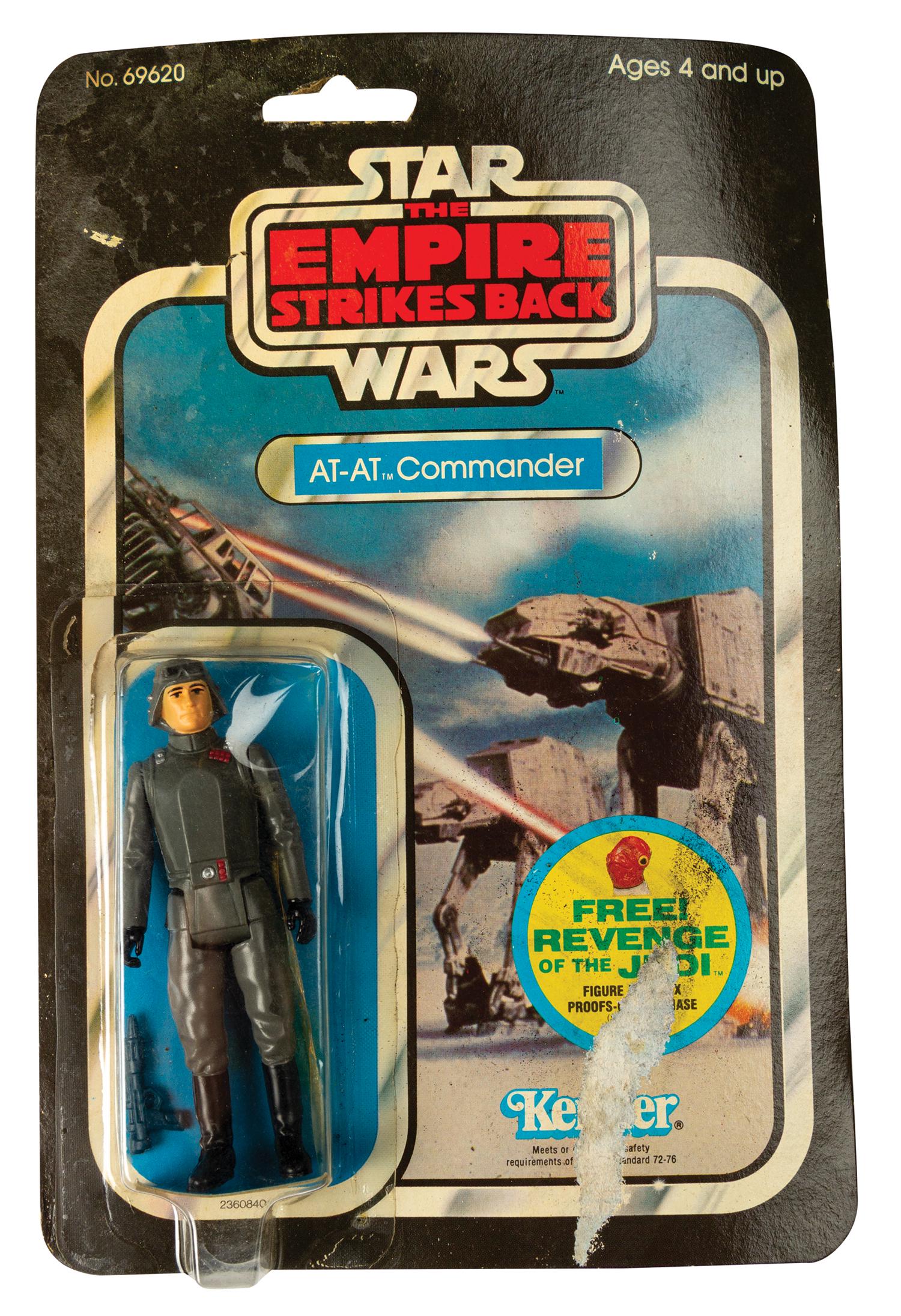 Kenner Star Wars AT-AT Commander Figure.: (Kenner, 1982) A very rare unopened AT-AT Commander figure by Kenner. Created as part of the 48-figure The Empire Strikes Back set, this figure has never been opened and the backing card promotes "Rev