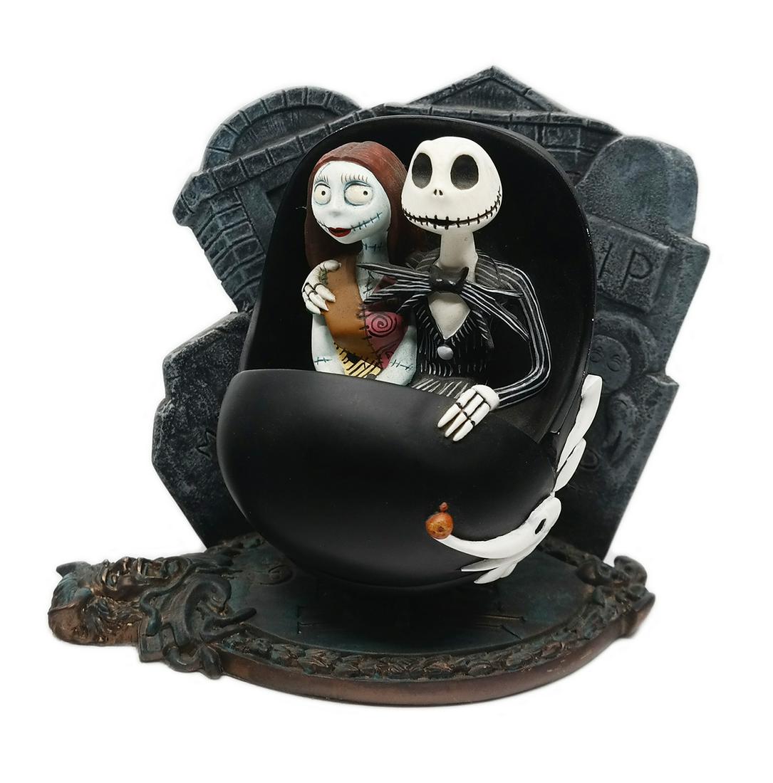 Nightmare Before Christmas Doom Buggy Figure.: (Disneyland, c.2001) A limited edition souvenir figure of Jack, Sally, and Zero in a Haunted Mansion Doom Buggy vehicle. These figures were offered at the "Nightmare Before Christmas Enchanted Evening