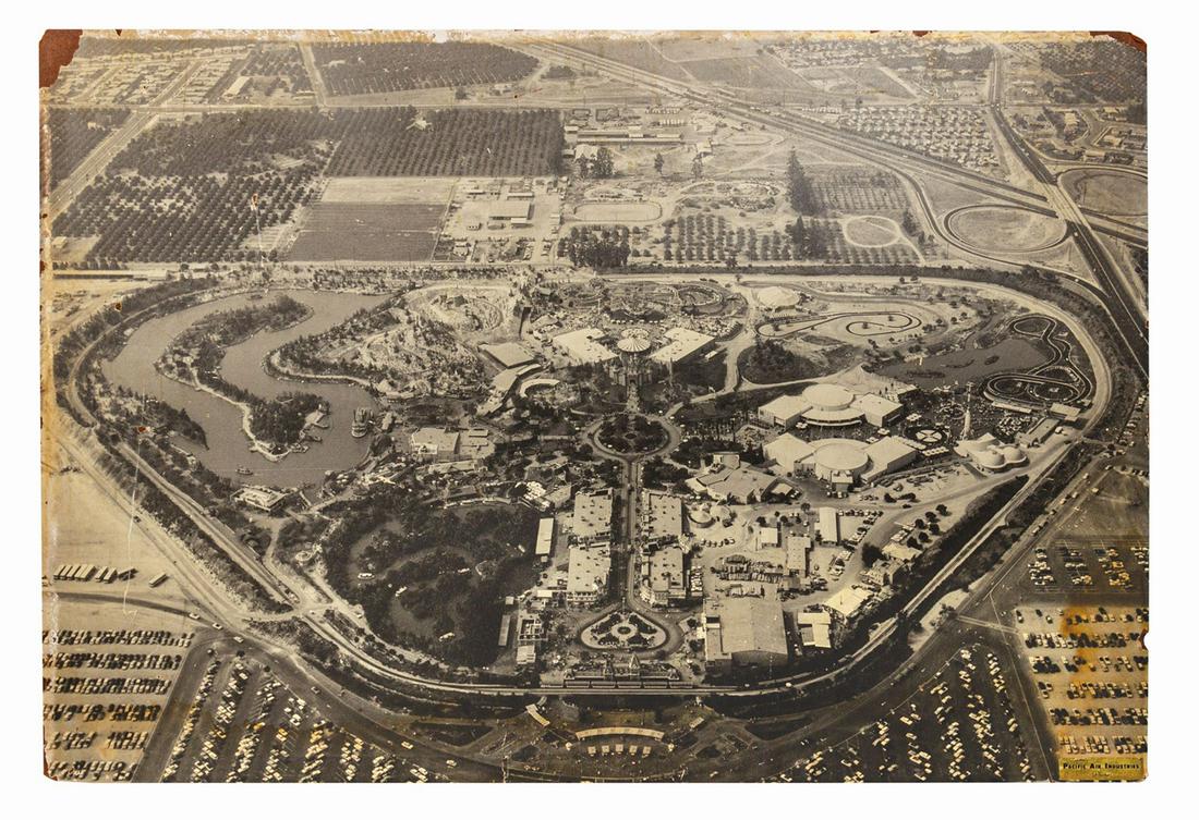 Large Disneyland Aerial Photo.: (Disneyland, 1956) An early aerial photograph of Disneyland from the collection of Disney Legend Milt Albright. The large photograph is mounted to masonite. A label on the reverse indicates that the p