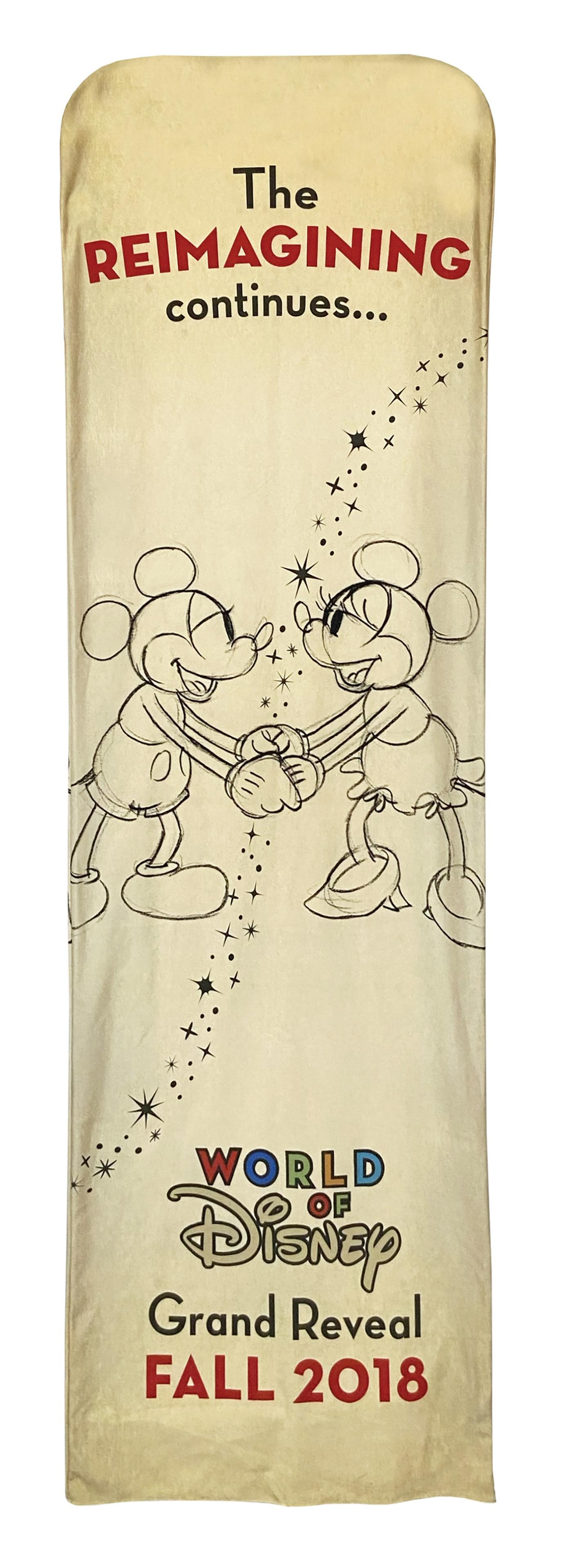 World of Disney Reopening Banner.: (Disneyland, 2018) A rare banner from the reopening of Disneyland's World of Disney. In 2018, Disneyland shut down many of its shopping areas to be refurbished or reimagined. This banner was created i