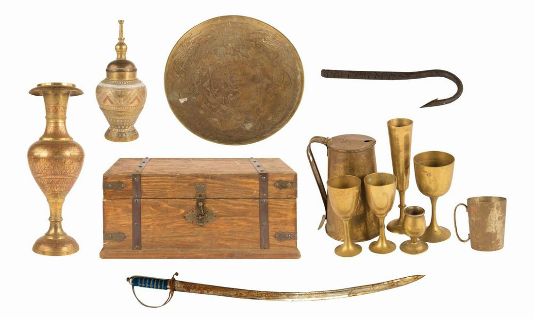 Collection of (13) Pirates of the Caribbean Props.: (Walt Disney World, c.1980s-90s) An impressive collection of (13) prop items from the Pirates of the Caribbean attraction at Walt Disney World. The collection includes a chest, sword, hook, (2) urns, 
