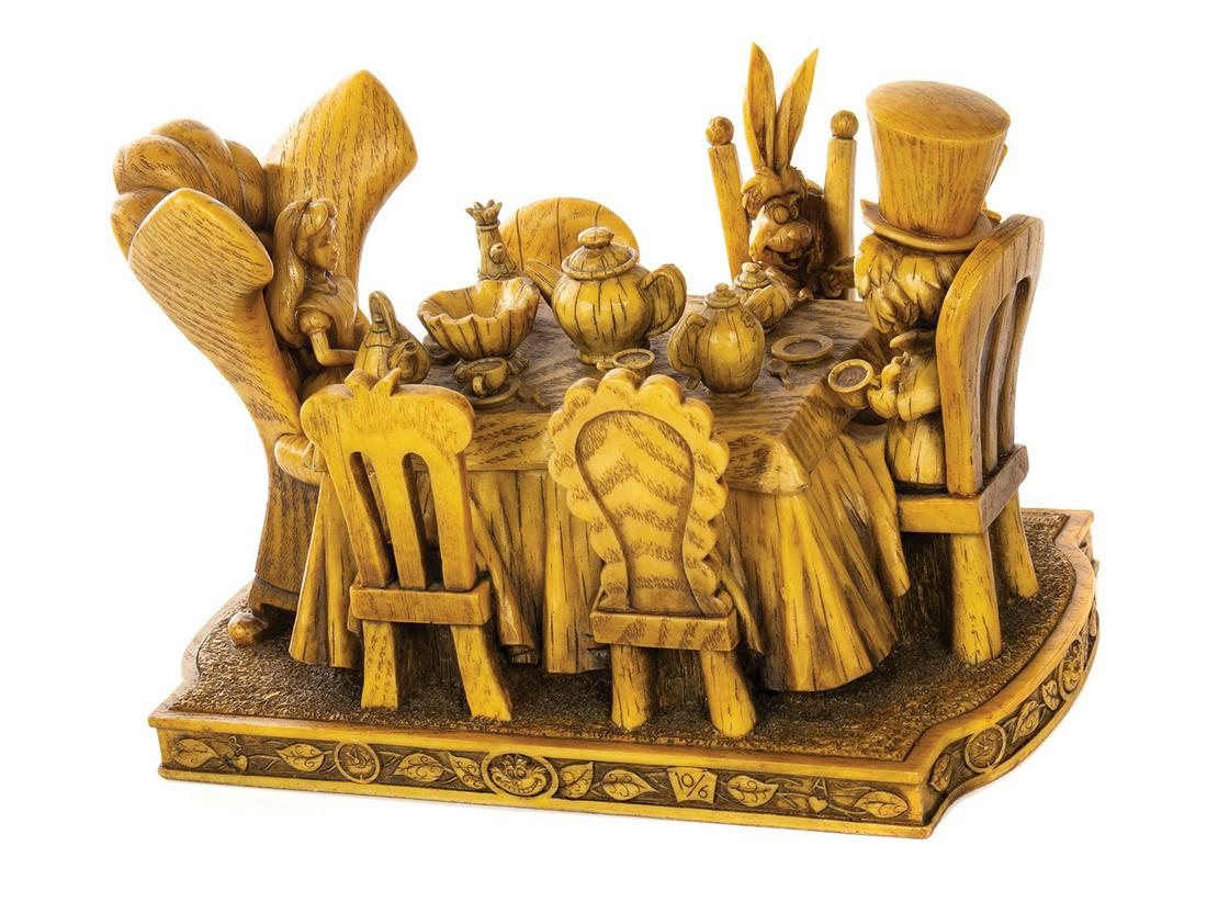 Alice in Wonderland Mad Tea Party Trinket Box: (Disneyland, 2008) A limited edition trinket box inspired by Alice in Wonderland. Created by famed artist Robert Olszewski for Disney's "Heirloom Collection," the table's top can be removed to uncover
