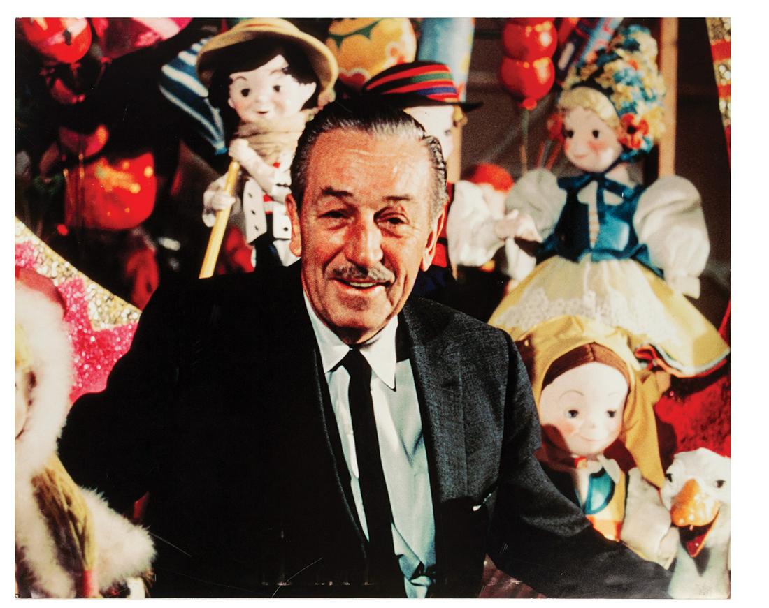 Walt Disney It's A Small World Presentation Photo.: (Disneyland, c.2000s) A large photo of Walt Disney with various animatronic dolls from the 1964-65 New York World's Fair version of the It's a Small World attraction. Publicity images of Walt such as