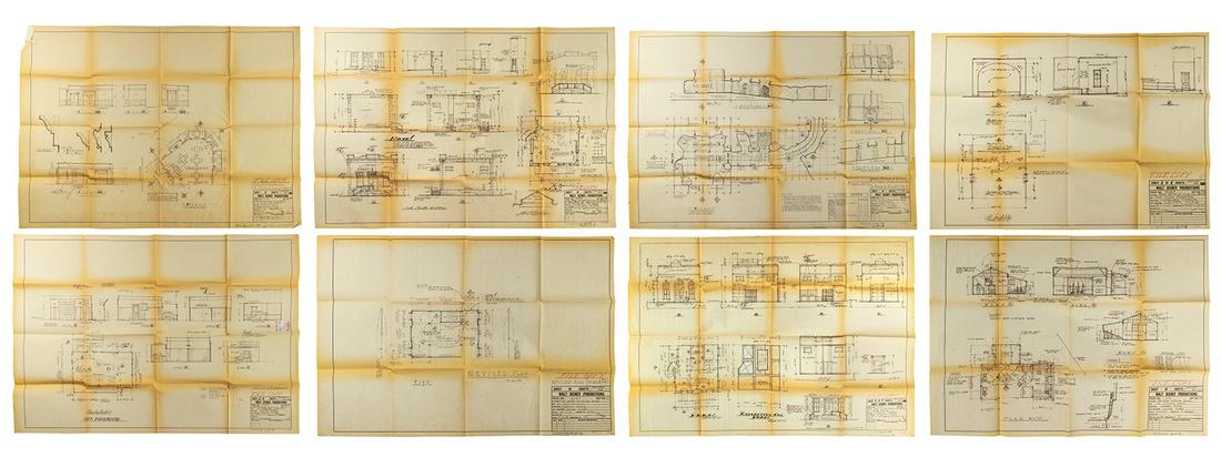Set of (8) The Apple Dumpling Gang Set Design Prints.: (Disney, 1975) A set of (8) blue line plans and elevations for interior and exterior sets for the film The Apple Dumpling Gang. All prints are marked "File Copy" in red colored pencil, and the majorit