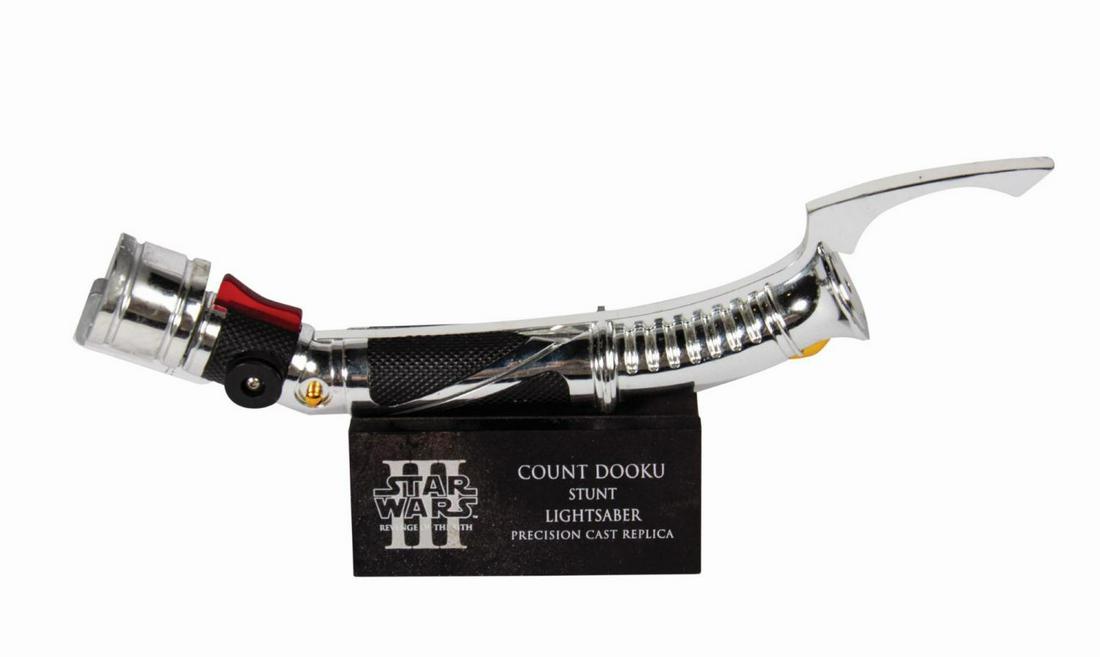 Count Dooku Stunt Lightsaber Prop Replica.: (Lucasfilm, 2005) A precision cast replica of Count Dooku's (Christopher Lee) stunt lightsaber from Star Wars - Episode III: Revenge of the Sith. Created by eFX, the lightsaber is constructed of chrom