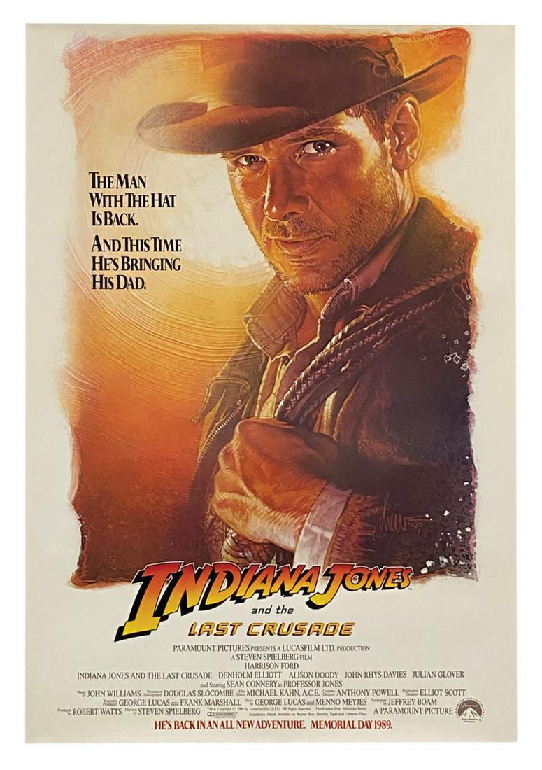 Indiana Jones and the Last Crusade Advance One Sheet.: (Paramount, 1989) A vintage Indiana Jones and the Last Crusade Advance one sheet poster. Featuring artwork by frequent Steven Spielberg collaborator Drew Struzan, the chest-up portrait of Indy with hi