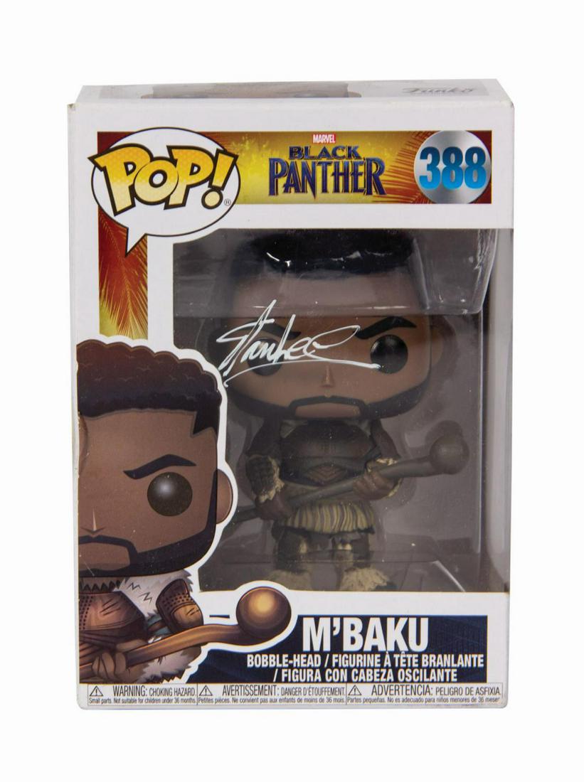 M'Baku Funko Pop Toy Signed by Stan Lee.: (Funko, 2018) A Funko Pop! vinyl figure of M'Baku from the afrofuturist Marvel Studios classic, Black Panther. Series number 388, the M'Baku pop retains its original windowed display box packaging. Th