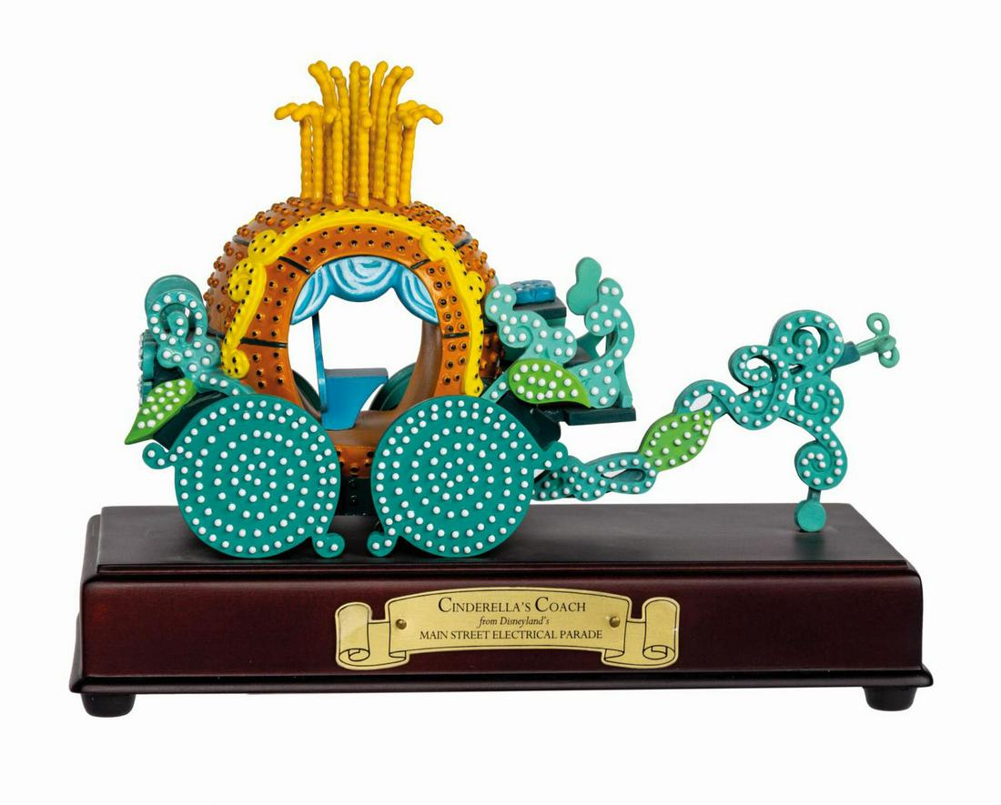 Main Street Electrical Parade Cinderella's Coach Figure: (Disneyland, 2000) A limited edition Main Street Electrical Parade Cinderella Coach figure from the Walt Disney Classics Collection. Only produced in the year 2000, this highly detailed cast resin fig