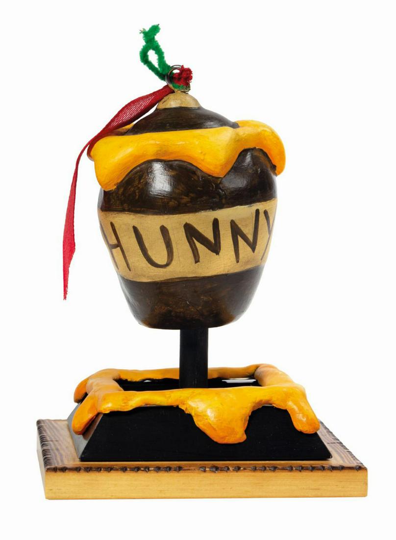 Critter Country Pooh "Hunny Pot" Holiday Ornament Prop.: (Disneyland, c.1990s) A Winnie the Pooh prop "hunny" pot ornament attributed to the Pooh Corner holiday display in Disneyland's Critter Country. Much of Pooh's life revolves around his favorite sweet 