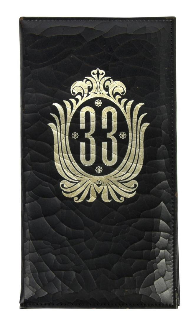 Club 33 Check Cover with Blank Check Slip.: (Disneyland, c.1990s) An original check cover from Disneyland's exclusive Club 33. This check cover features a large gold logo for the club and contains an unused paper check slip inside. The padded c