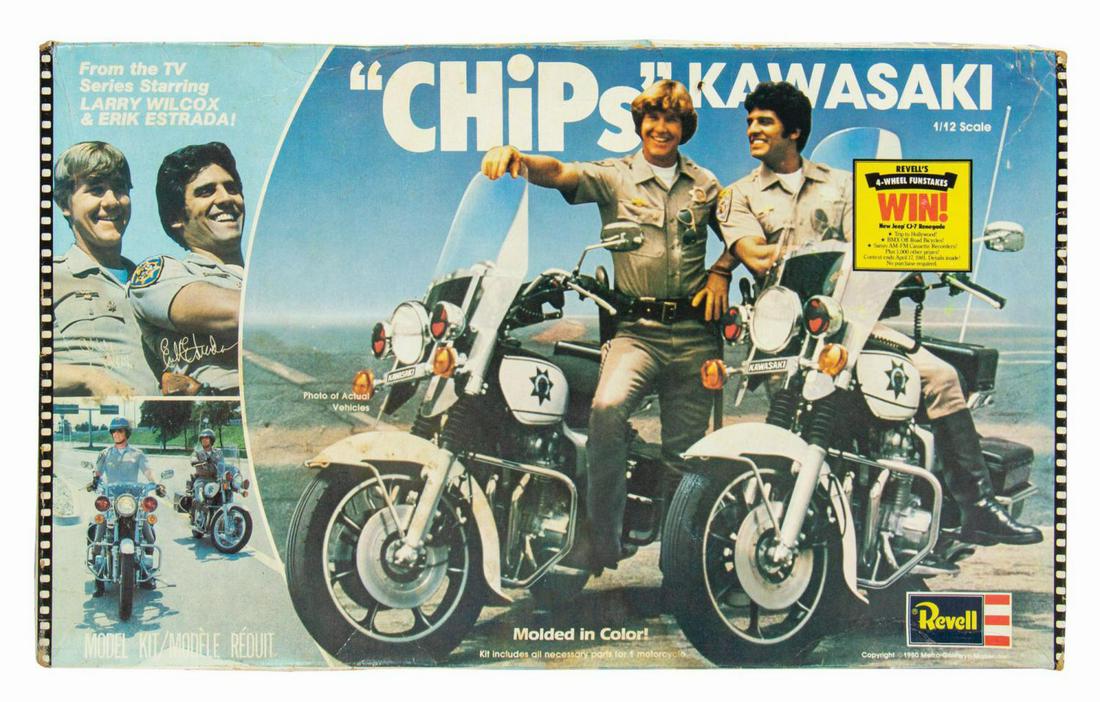 CHiPs Kawaski Police Motorcycle Model.: (Revell, 1980) A vintage CHiPs Kawaski Police Motorcycle 1:12 scale model manufactured by Revell. Consisting of plastic components, nearly all pieces are still attached to their runners. A decal sheet