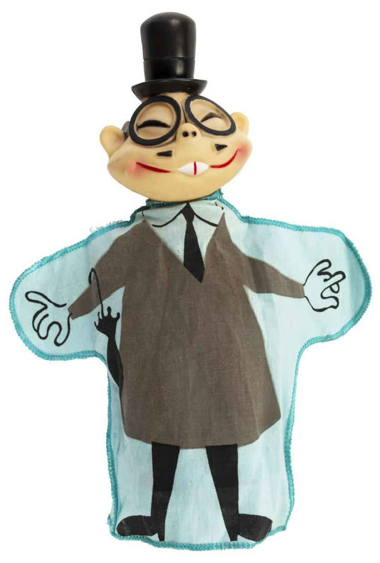 Dick Tracy Joe Jitsu Hand Puppet.: (Chicago Trib., 1961) A hand puppet of Joe Jitsu, the police officer and memorable sidekick of Dick Tracy from the similarly titled animated series. In more recent years, Jitsu has been edited out of 
