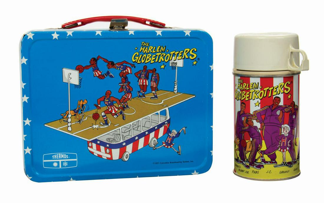 The Harlem Globetrotters Lunch Box and Thermos.: (King-Seeley Thermos, 1971) A vintage Harlem Globetrotters tin lithographic lunch box with matching thermos manufactured by King-Seely Thermos. The lunch box has a plastic handle, hinged lid, metal cl
