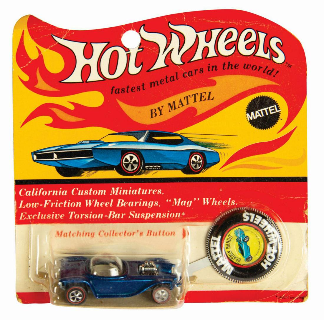 Signed Hot Wheels Blue Beatnik Bandit on Card.: (Mattel, 1969) A very rare blue colored Beatnik Bandit die-cast car by Hot Wheels. This hotrod design was created in 1961 by legendary car customizer and visual artist, Ed "Big Daddy" Roth, with this 