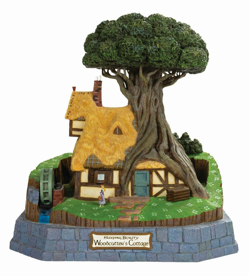 Sleeping Beauty Woodcutter's Cottage Magical Big Fig.: (Disney, 2004) A Sleeping Beauty Woodcutter's Cottage Magical Big Fig. The intricately detailed model features a removable 1.75" tall Sleeping Beauty figure. There is a battery compartment in the bott