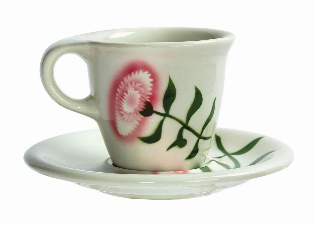 Carnation Ice Cream Parlor Russel Wright Cup & Saucer.: (Disneyland, c. 1950s) A rare park used cup and saucer set from the Carnation Ice Cream Parlor in Disneyland's Main Street, U.S.A. Manufactured by Russel White, the elegant Sterling China cup and sauc