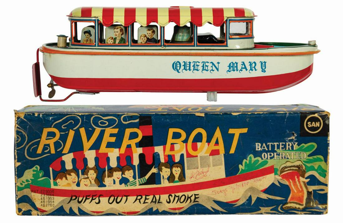 River Boat Japanese Tin Toy.: (Marusan SAN, c.1960s) A vintage Japanese tin river boat toy inspired by the Jungle Cruise. While this is an unlicensed toy, the red and white awning and the imagery on the box clearly draw from the p