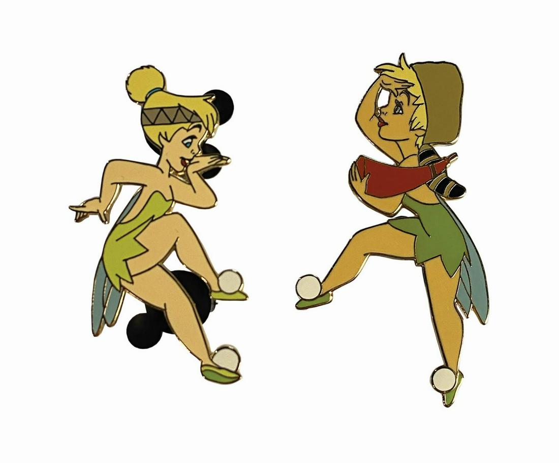 Pair of Tinker Bell Frontierland Pins.: (Disneyland, 2004) A pair of Frontierland themed Tinker Bell pins from Disney Auctions. One pin features Tink scouting in a coonskin cap and other showcases her dancing with what is meant to be a Nati